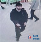 A man walking in a shop