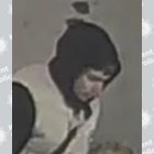 A CCTV image of a male