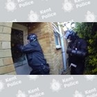 Officers entering property in Eastchurch
