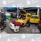 Pictures of cars in a garage
