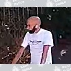 CCTV image of a man on an e-scooter