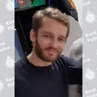 A man in his 30s with blond hair and a beard.