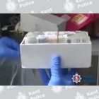   Some of the cash located during the property search.